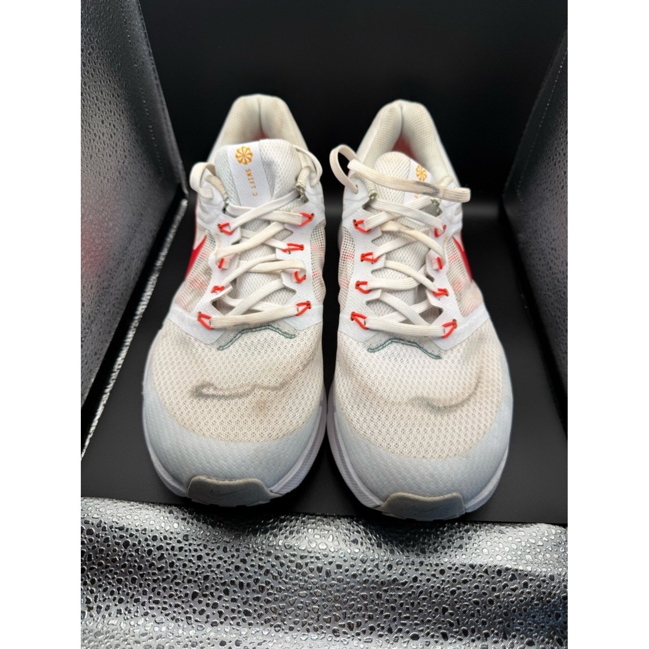 Nike White Athletic Shoes with Red Swoosh