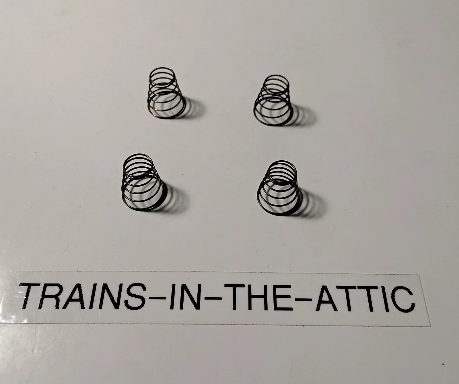 LIONEL CONICAL SPRING PART 164-16. NEW PACK OF (4)