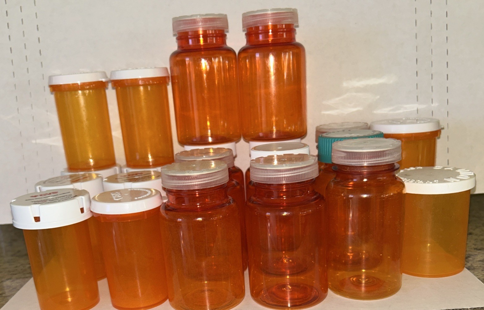ASSORTMENT of 21 plastic prescription bottles different sizes