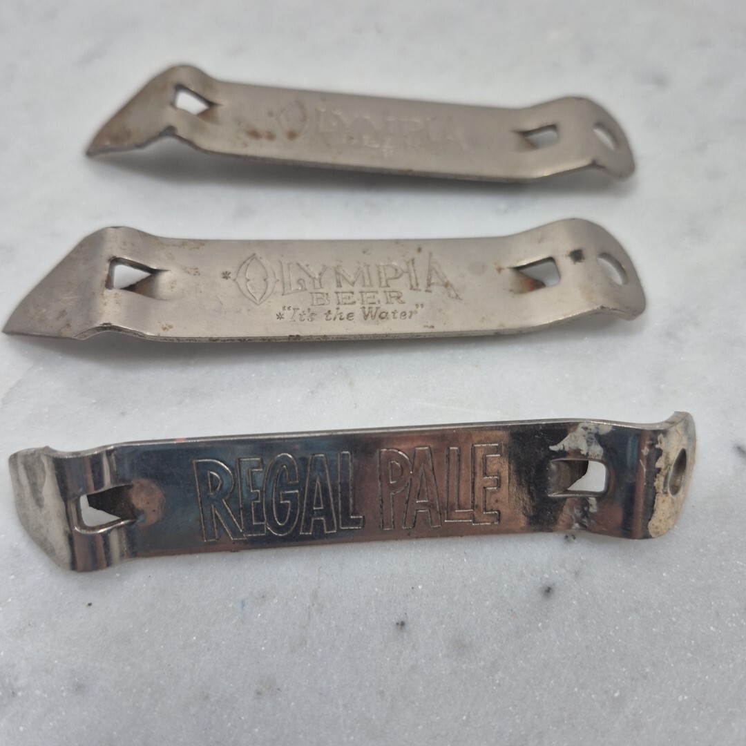 2- Vintage Metal Bottle Opener OLYMPIA Brewing Co "It's In The Water"  1 Regal
