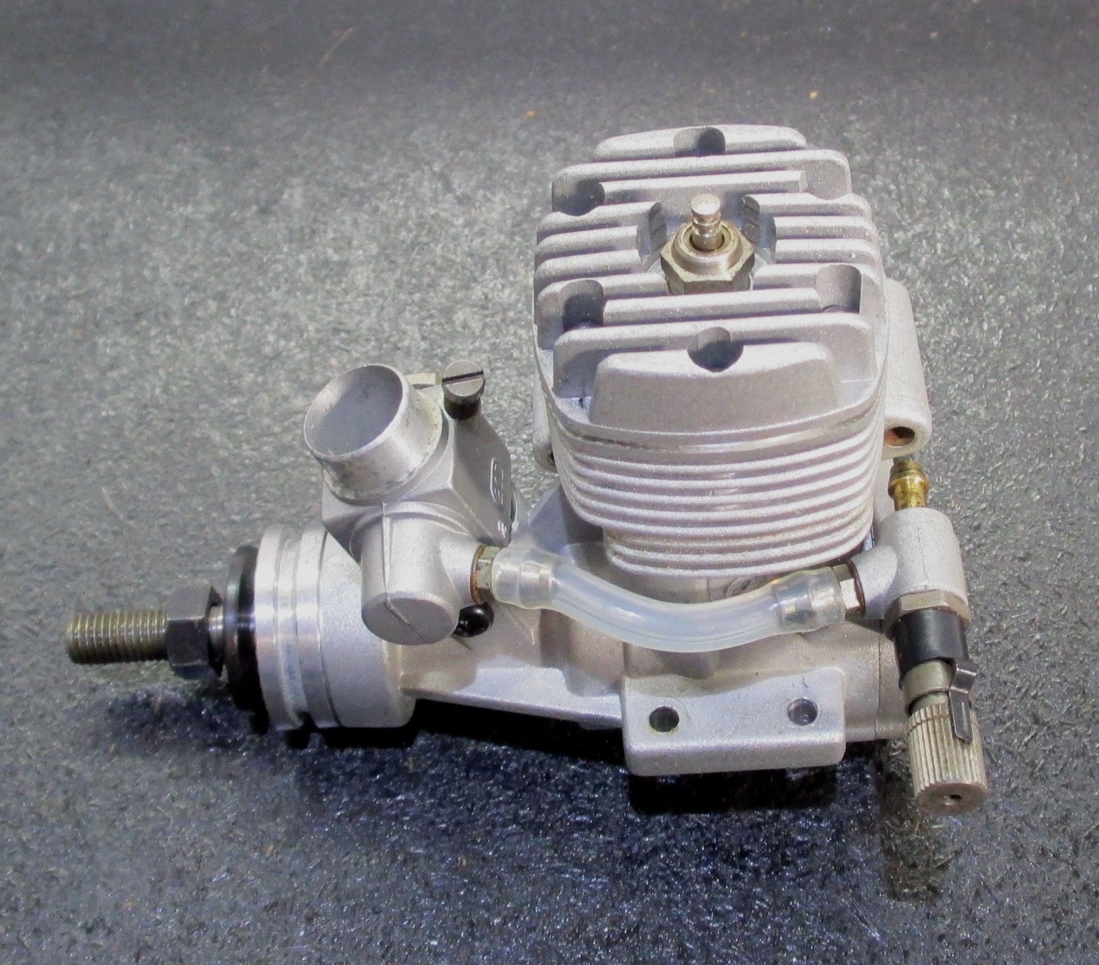 O.S. MAX-25FX 4.07cc 2-Stroke Glow Engine Includes muffler; used for RC airplane