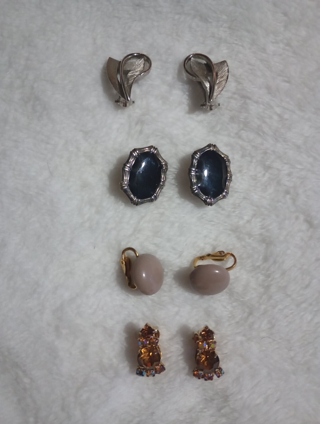 Vintage Four Pairs Of Unmarked Clip On Earrings Black, Silver, Brown