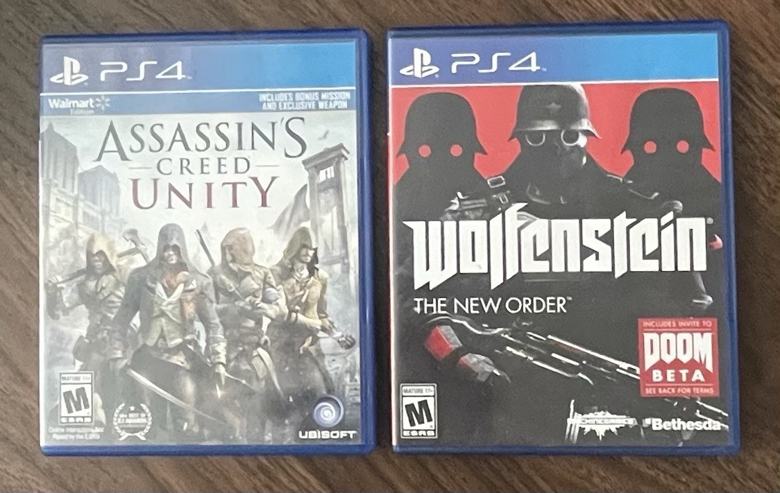 Lot Of (2) PS4 Games - Assassin’s Creed Unity And Wolfenstein The New Order