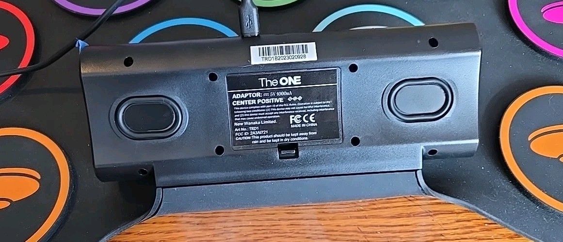The ONE TRD1 Electric Drum Pad With Drum Sticks.