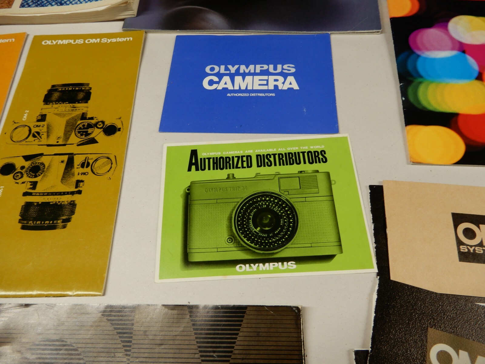 Olymous OM-2 Manual and Many Awesome OM System Sales Brochures