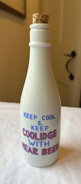 Calvin Coolidge Near Beer Bottle