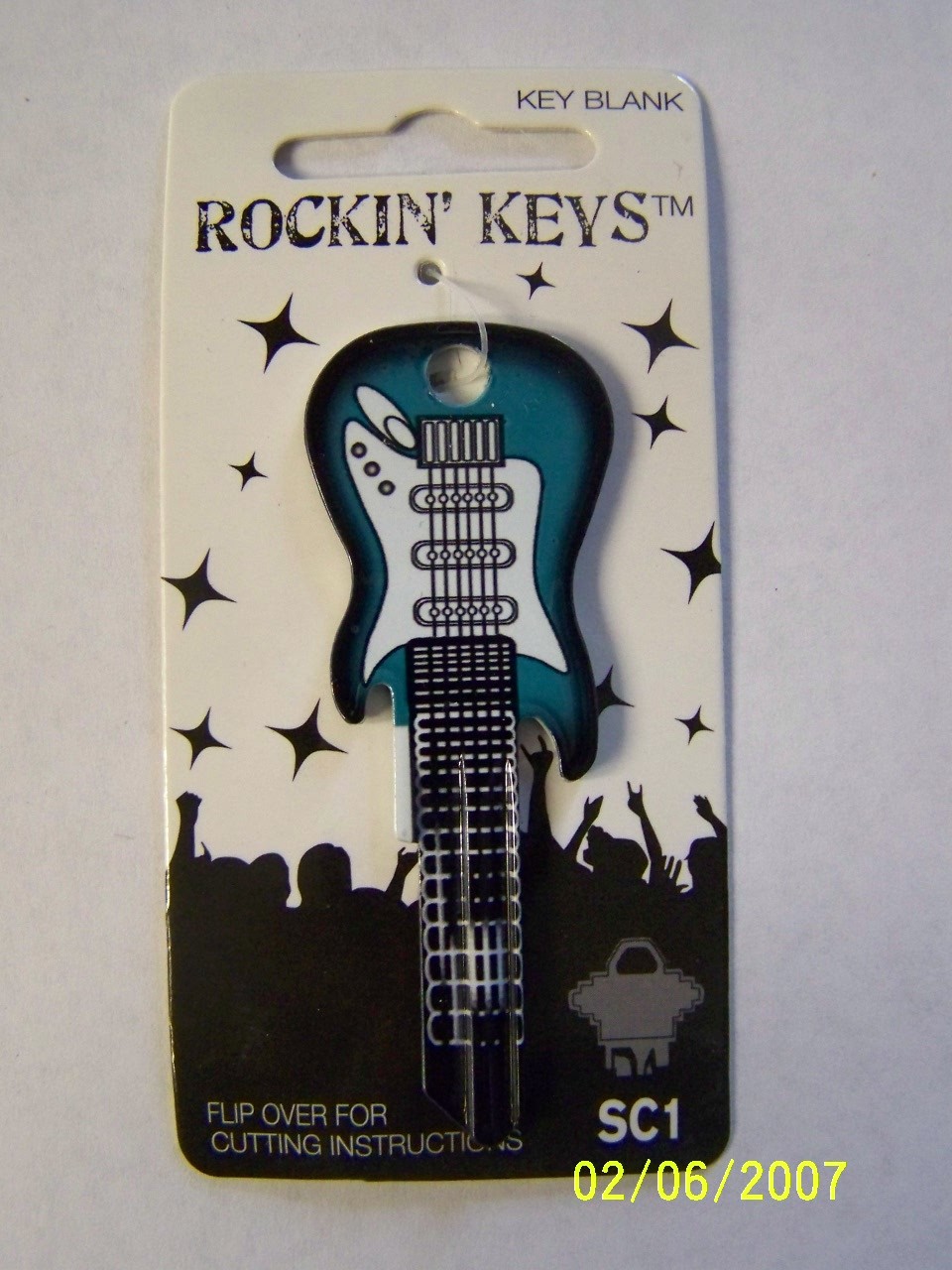 Surf Green Elecric Guitar  shape Schlage SC1 house key blank.
