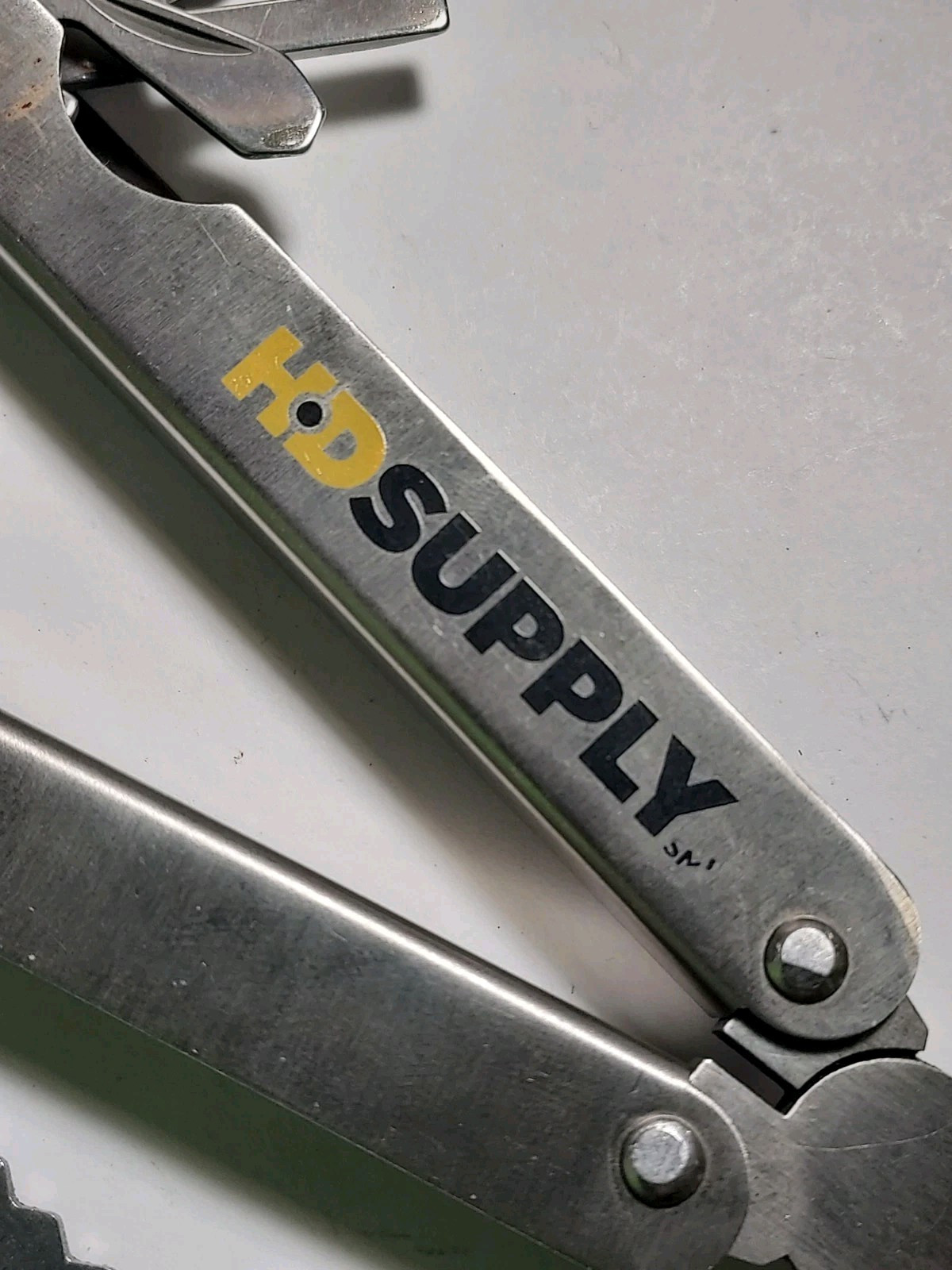 2 HD Supply Multi Tools with Nylon Pouch - 1 used, 1 new