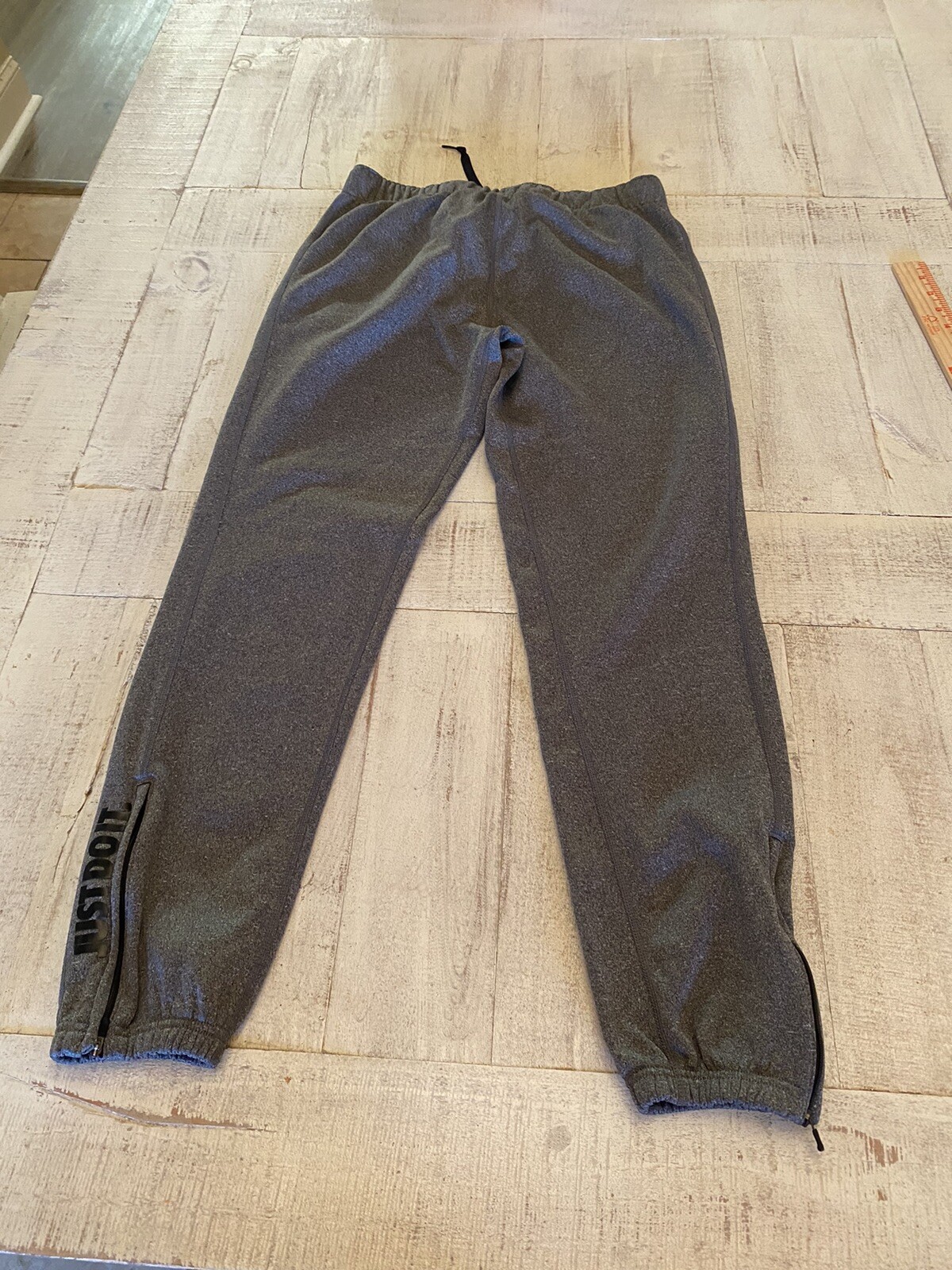 Mens nike small gray joggers with zipper on legs