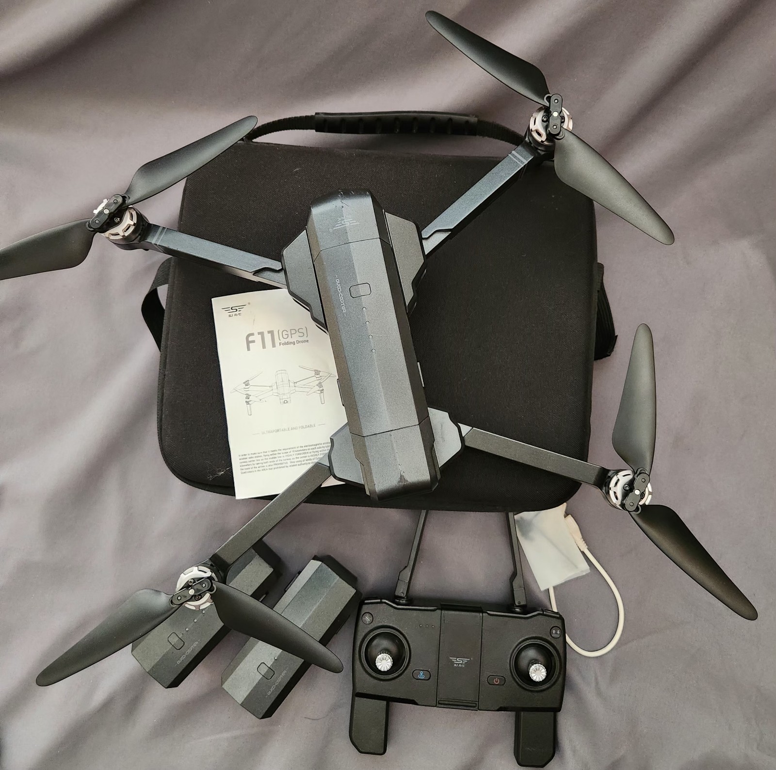 F11 GPS Camera Folding Drone Quadcopter with Carrying Case 2 Extra Batteries