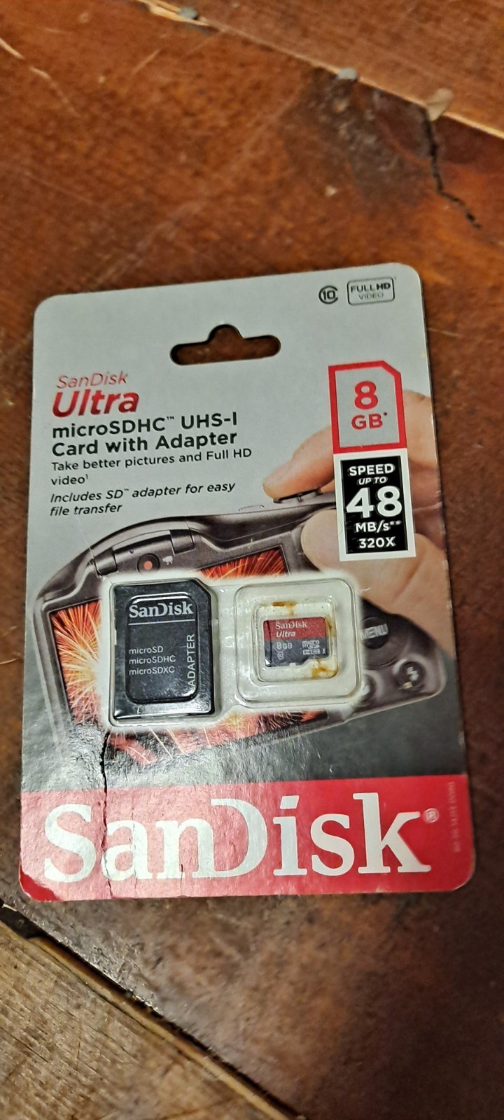 SanDisk Ultra microSDHC UHS-I Card with an adapter.