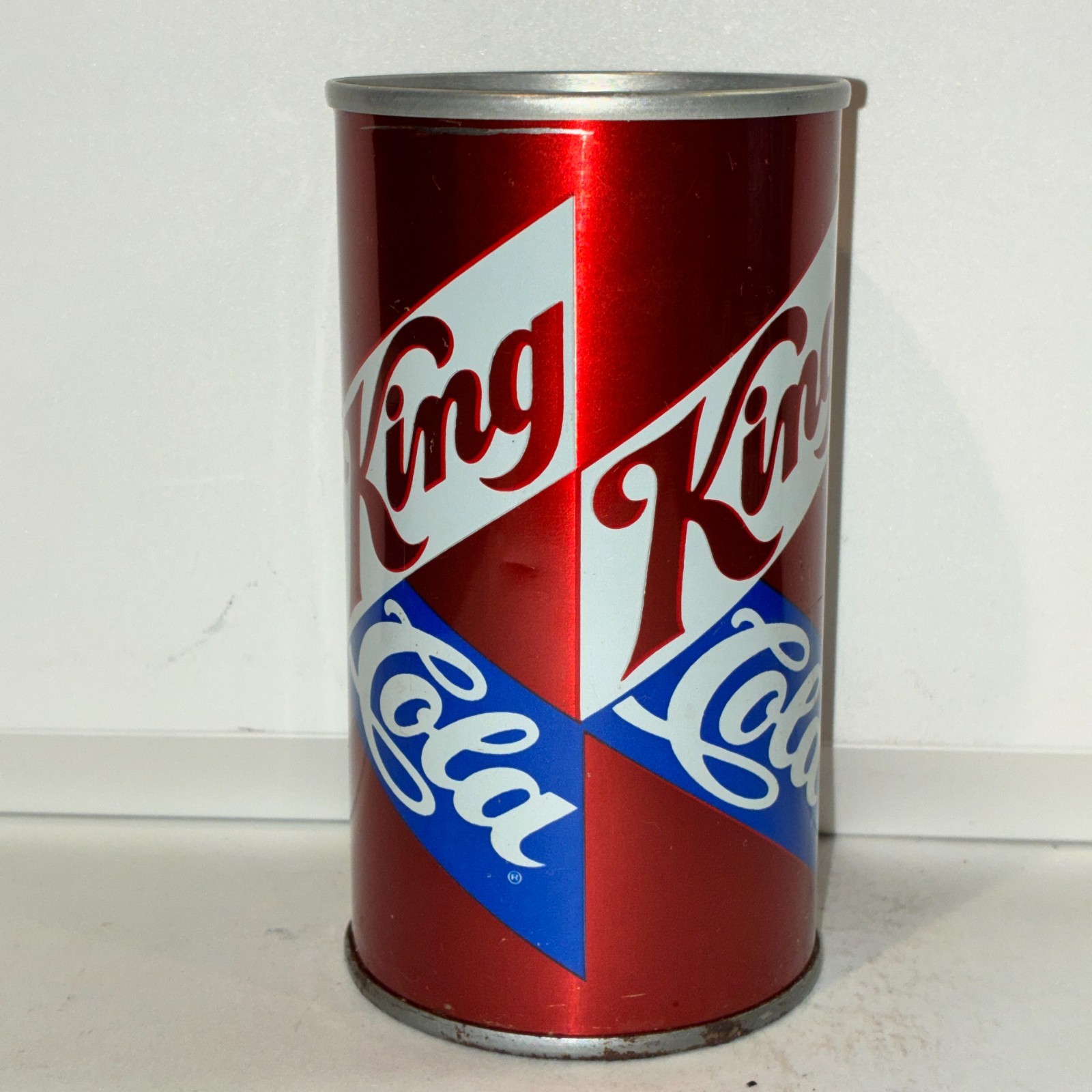 King Cola soda can, bottom opened, straight steel