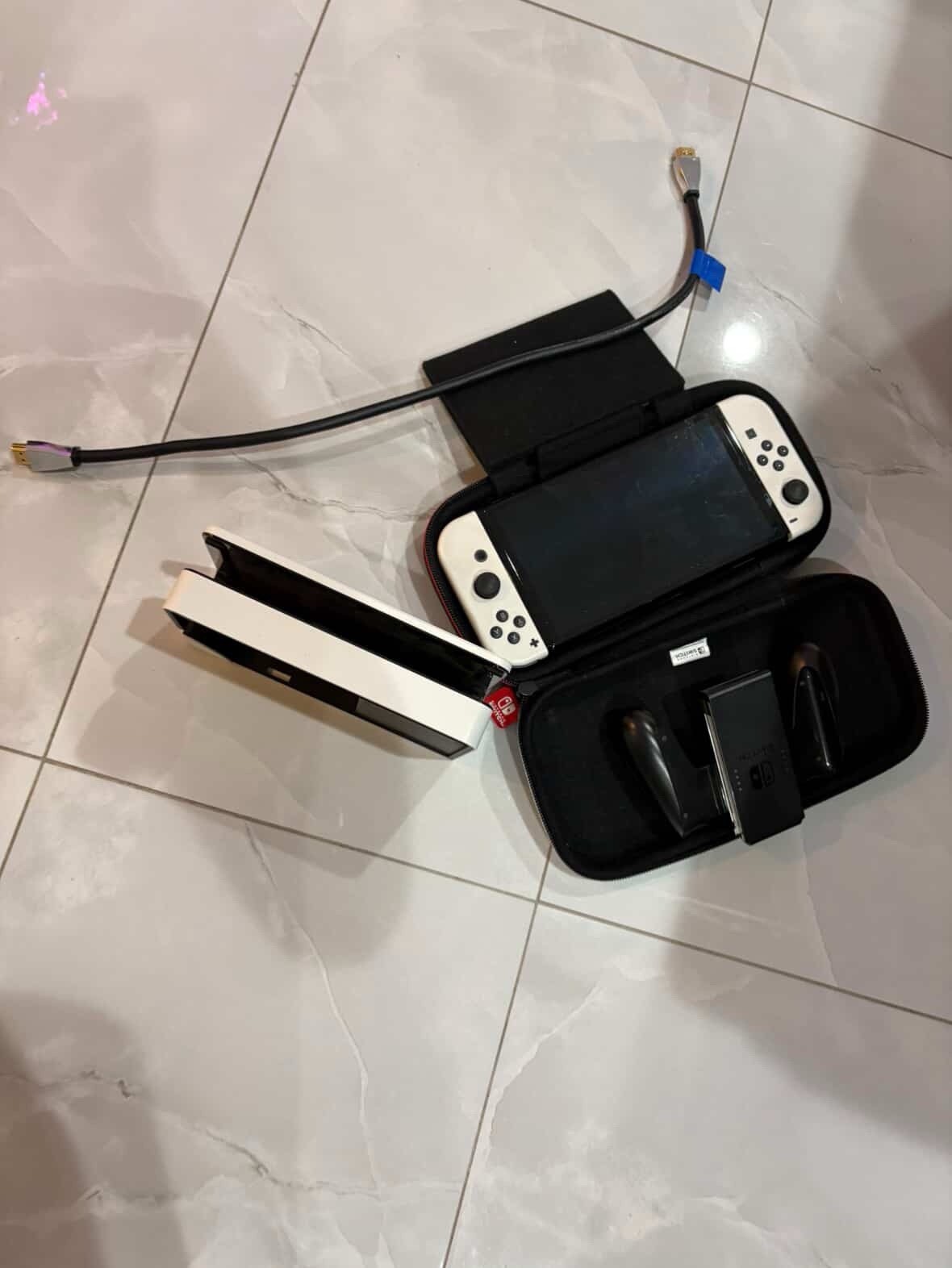 Nintendo Switch OLED, HDMI cable, Joy-Con, Dock, Carrying Case, Grip