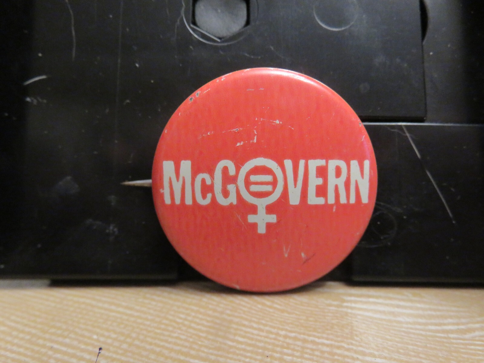 GEORGE McGOVERN PINBACK (Orange-red 1 1/8" in diameter)