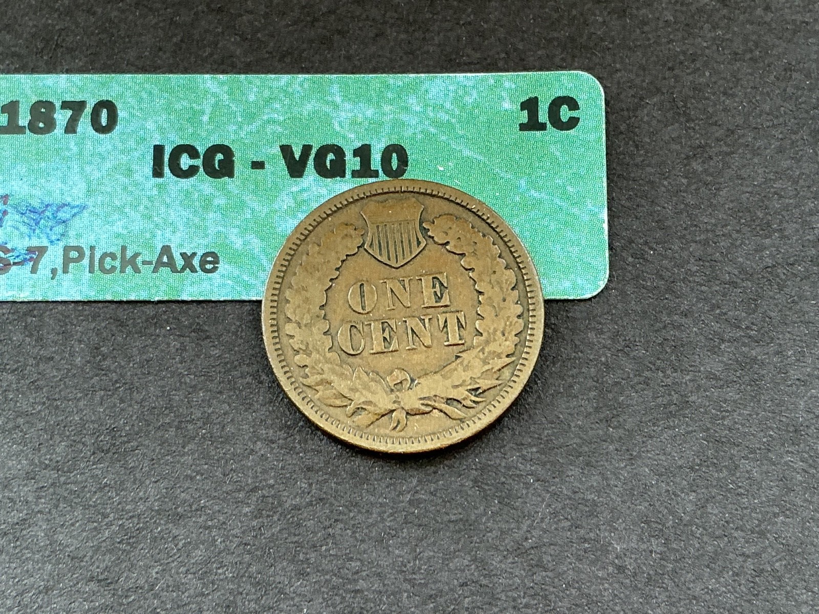 1870 indian head cent “ PICK AXE “. VG-10 choice
