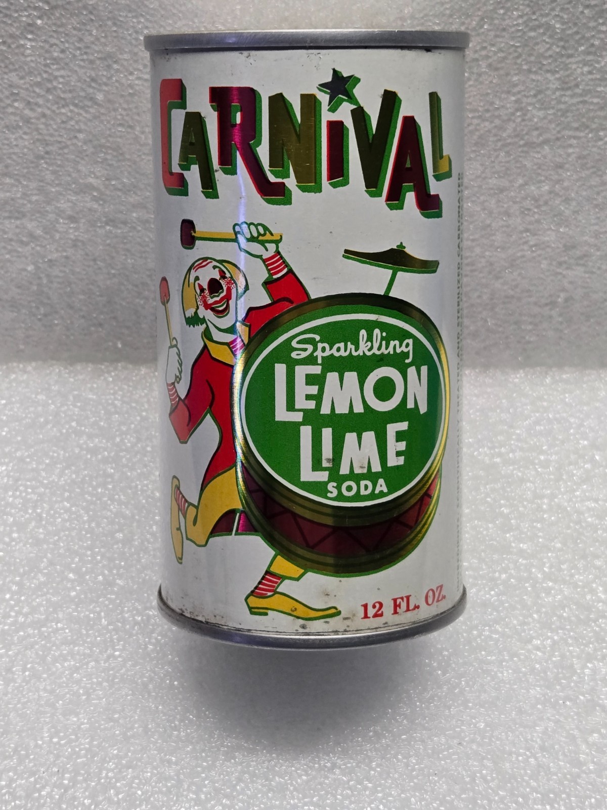 Vintage Carnival Lemon Lime Clown Jester Drummer Straight Steel Soda Pop Can