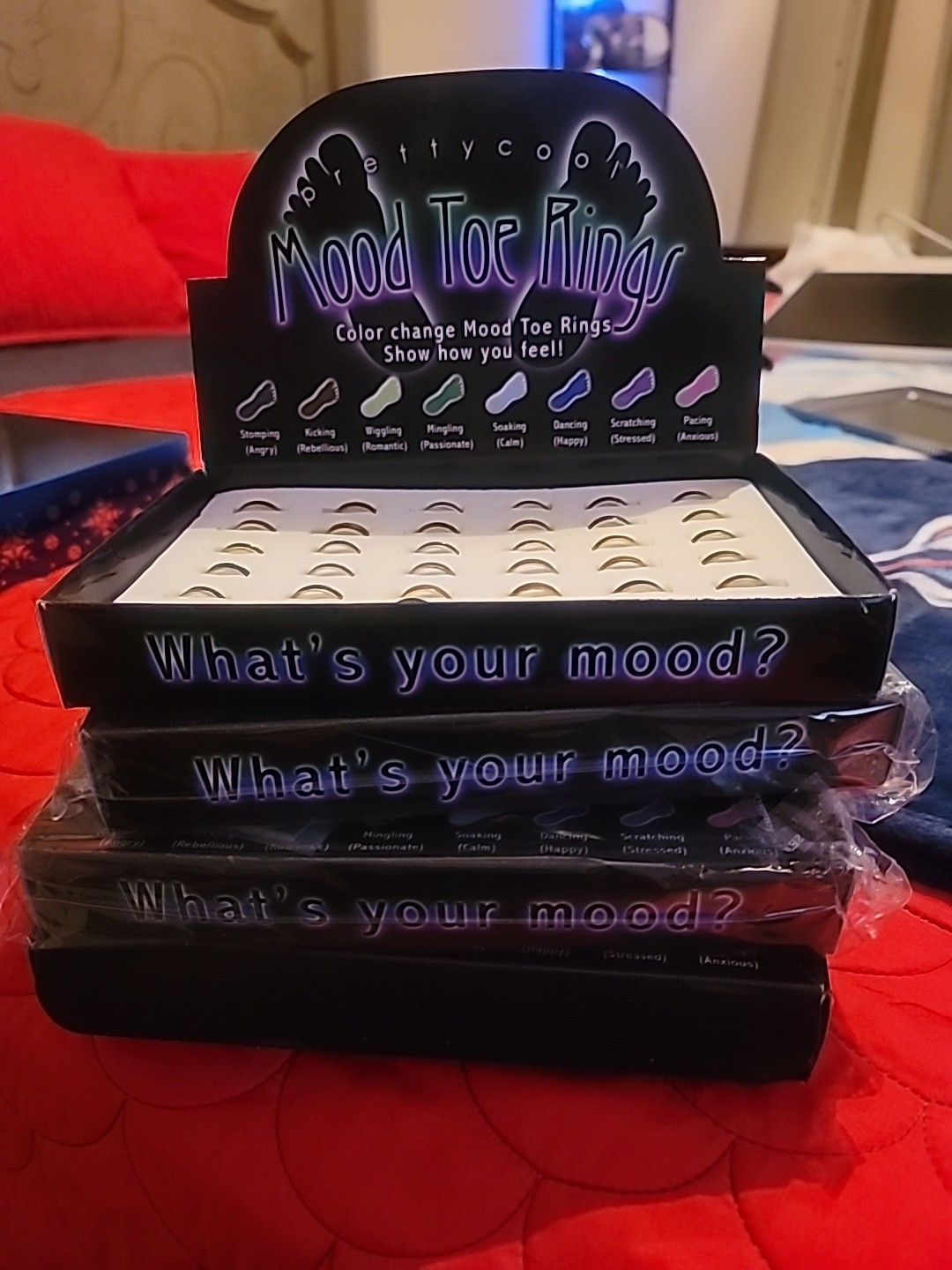 4 -36 count boxes of Mood Toe Rings.