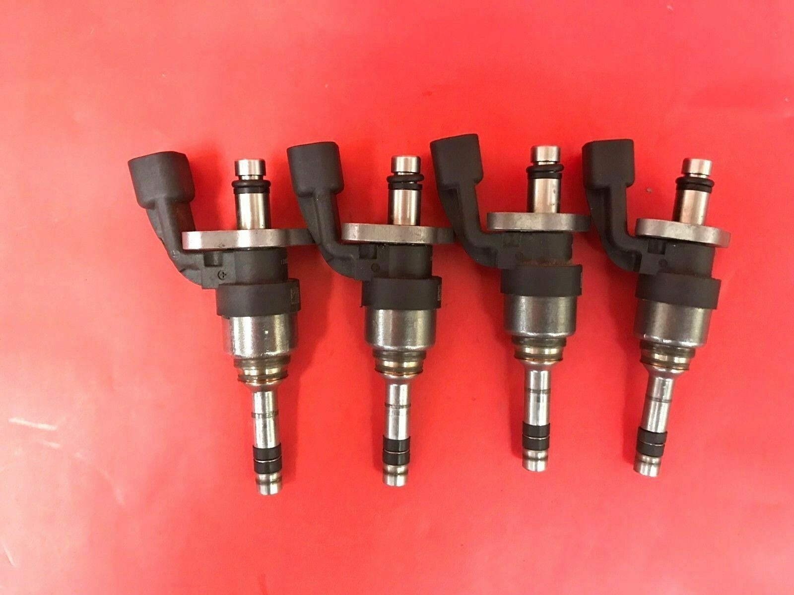 This is a set of 4 Take-off OEM fuel injectors GM Original Equipment 12673290
