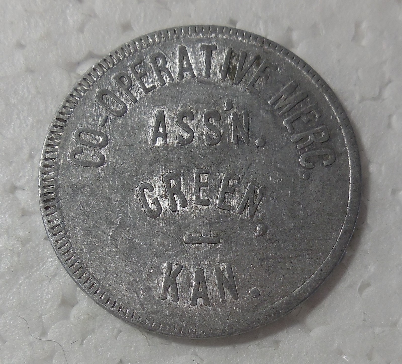 GREEN KANSAS CO-OPERATIVE MERC. ASS'N. GOOD FOR $1.00 IN MERCHANDISE TOKEN