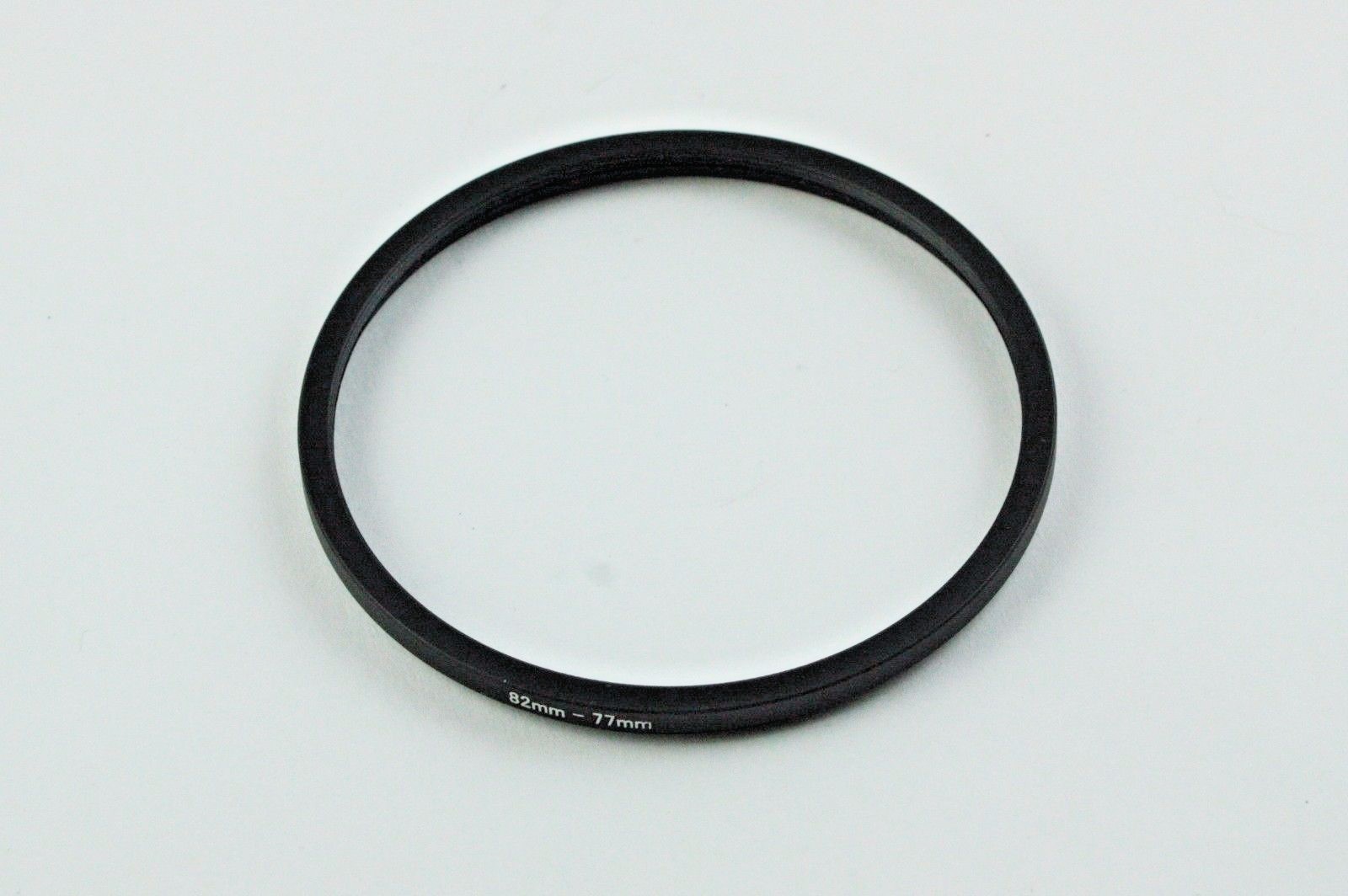 Step-Down Ring - 82mm to 77mm - For Filters Lens Hoods & More - 82-77mm