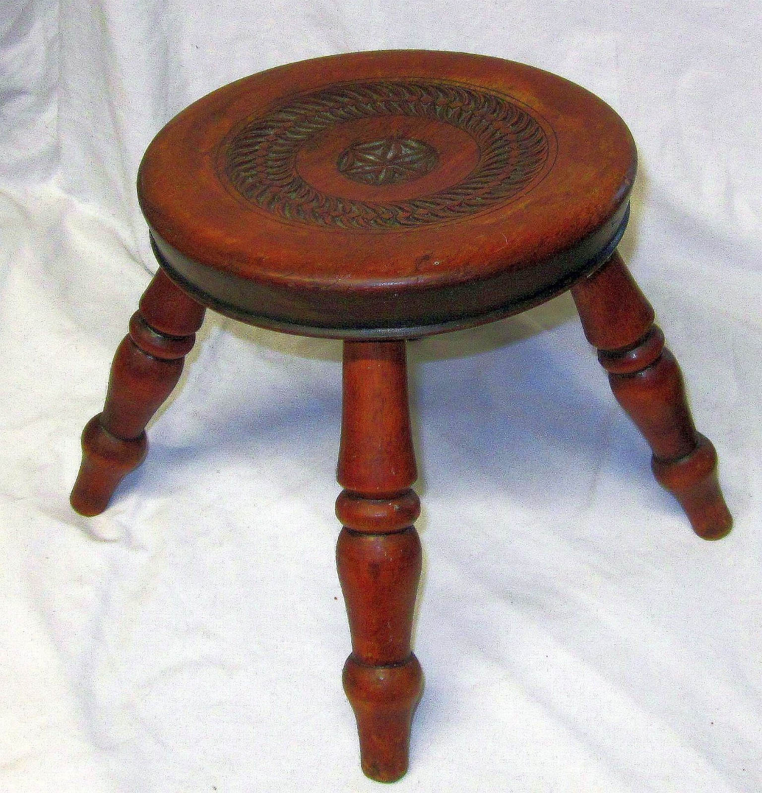 Nice Antique Hardwood Stool , with carving to the top