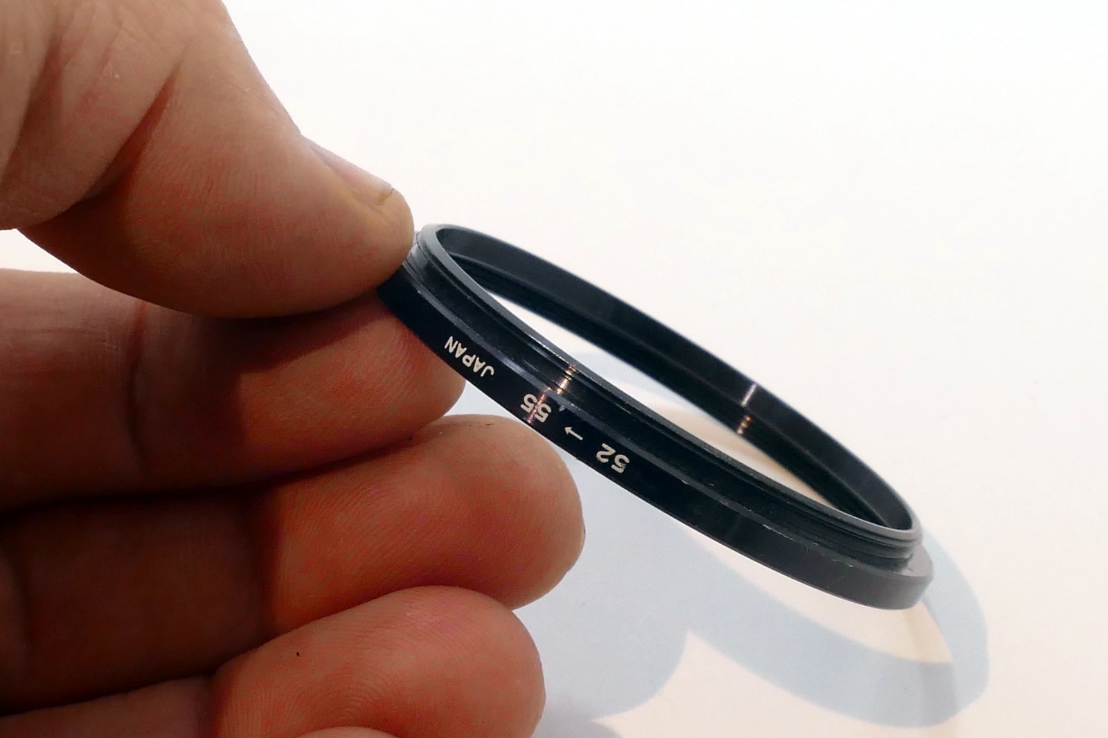 Lens adapter ring from 52mm to 55mm step-up metal threaded