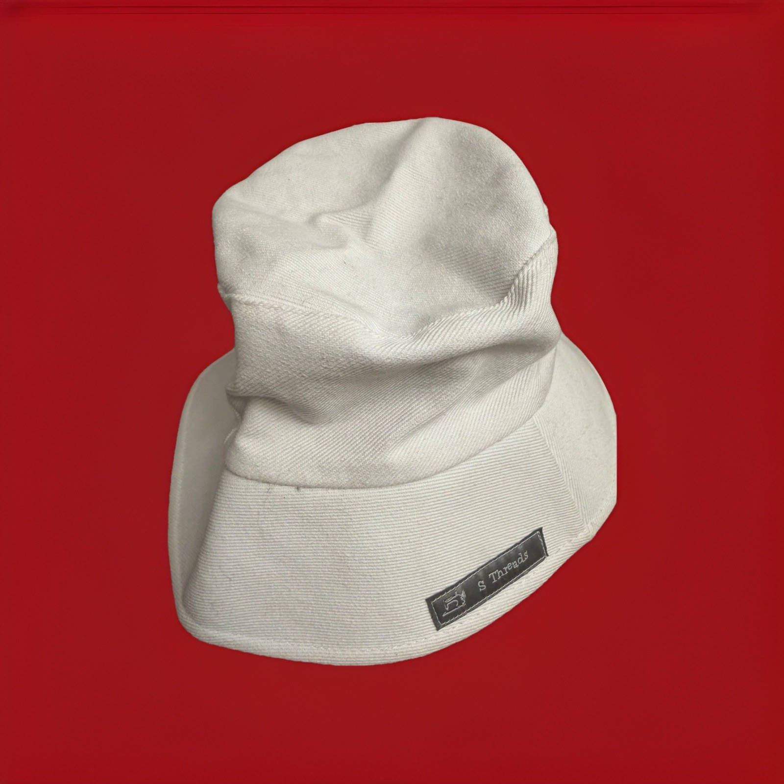 S Threads women’s white and black floral reversible bucket hat.