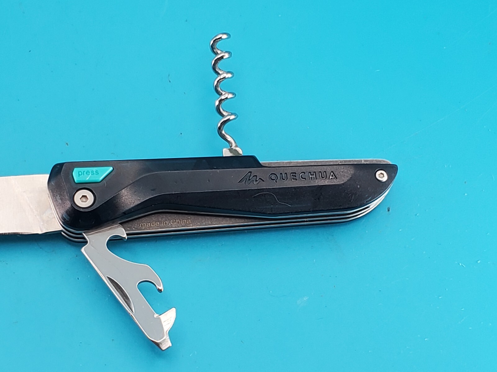 QUECHUA CLAP FOLDING KNIFE NAVAJA MULTITOOL! TRANSLUCENT BLUE!