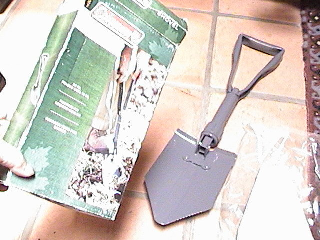 coleman folding shovel new in box size 23 inches open 10" closed