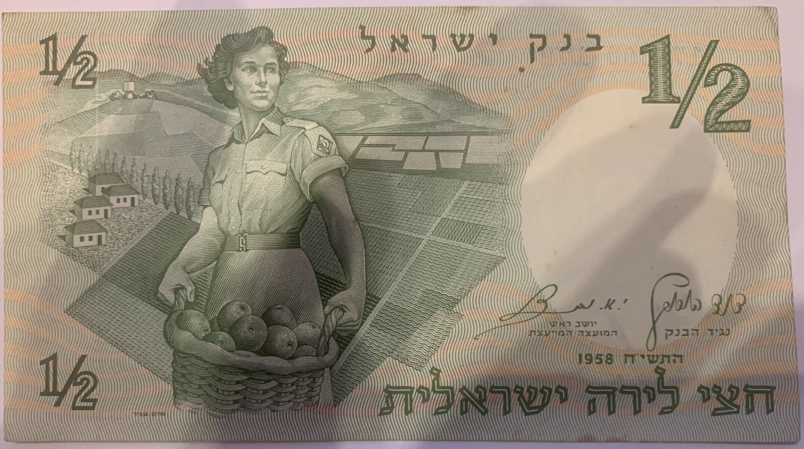 Journey Through Time: Own a Piece of Israeli History with the 1958 1/2 Lira