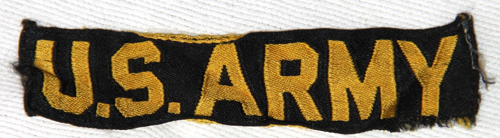 ORIGINAL KOREA-VIETNAM MACHINE WOVEN GOLD ON BLACK U.S. ARMY UNIFORM TAPE
