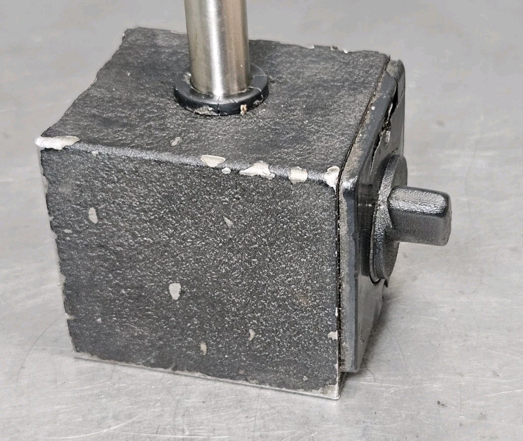 Starrett No. 196 dial indicator with a ??? magnetic base