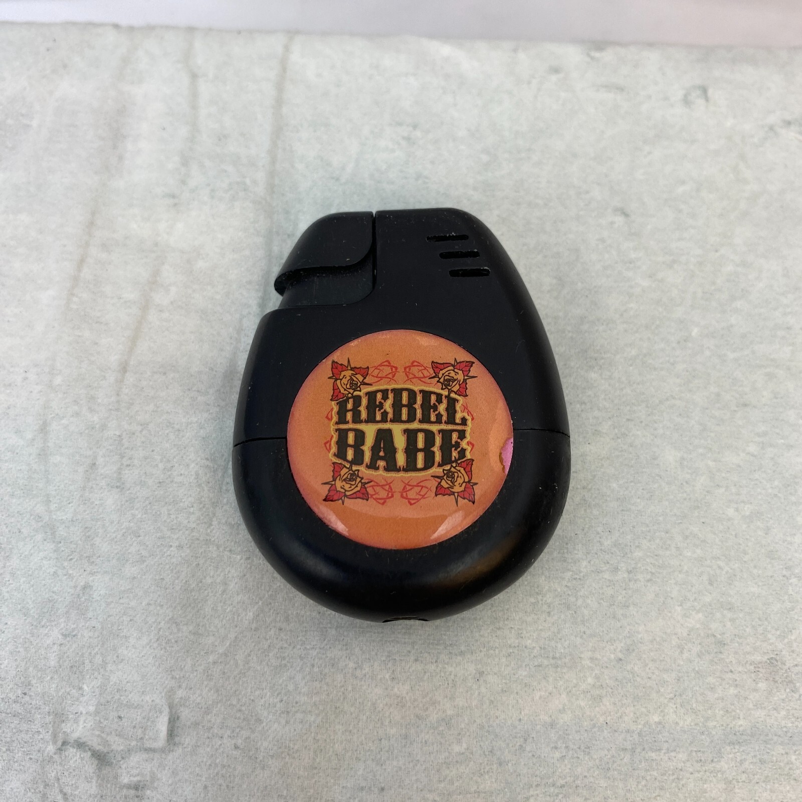Refillable Lighter With "Rebel Babe"
