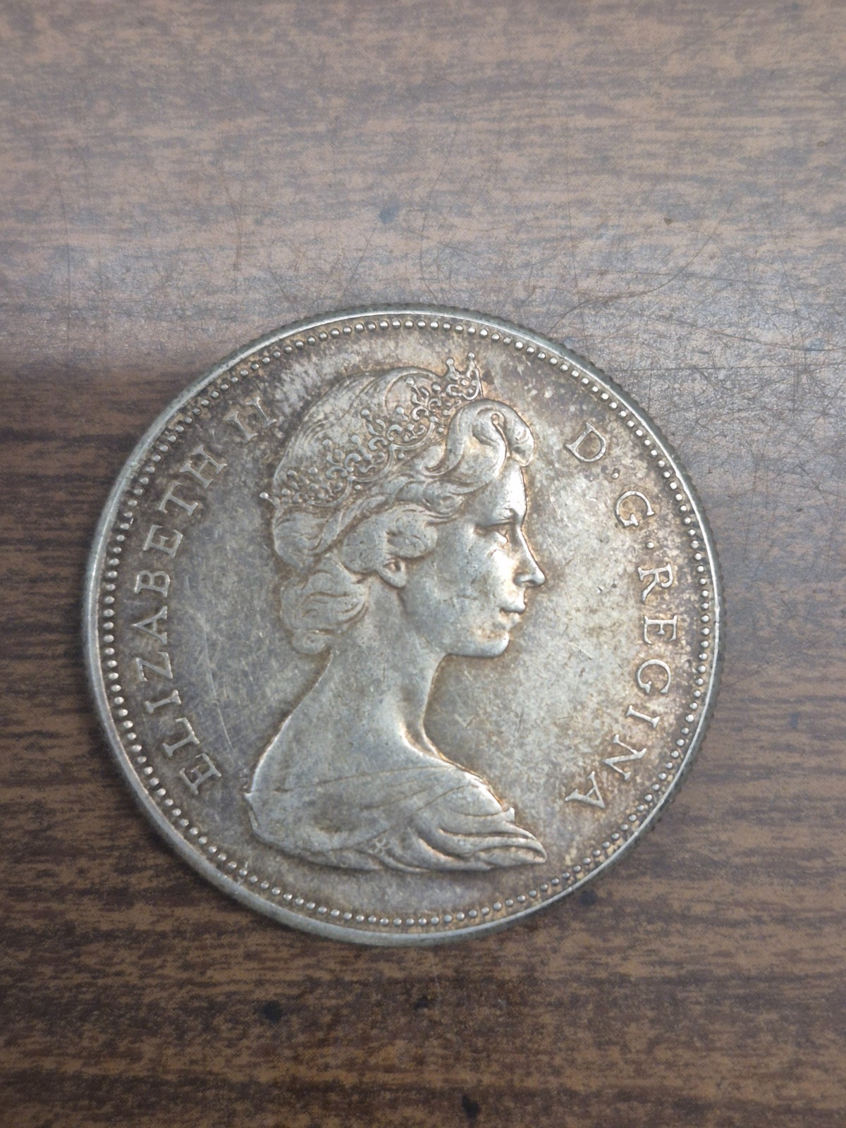 1867-1967 80% SILVER CANADIAN ONE DOLLAR ELIZABETH II D.G.REGINA