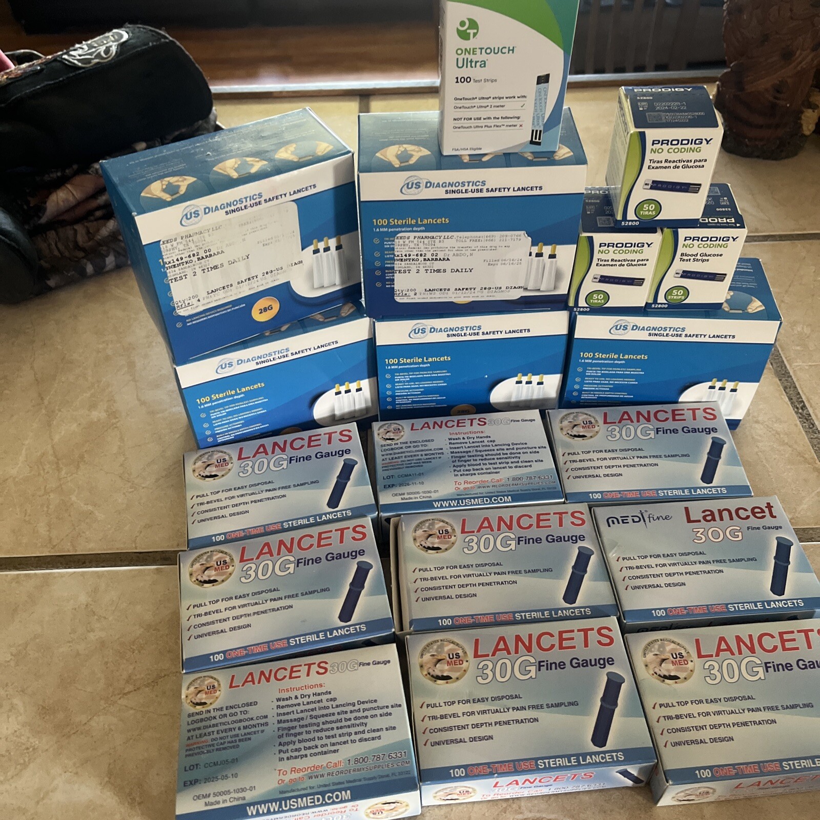 5 boxes of 100lancets  9 boxes 30g one touch and 3 boxes prodigylook description