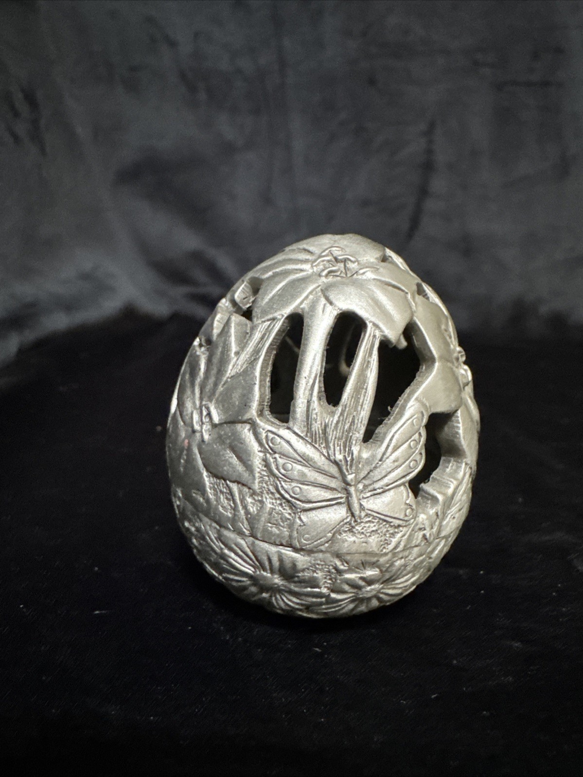 Pewter Port Carved Egg Figure With Floral Garden Scene And Butterflies