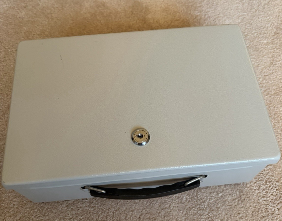Beige Lockable Security Box with 2 Keys.  Used and clean condition