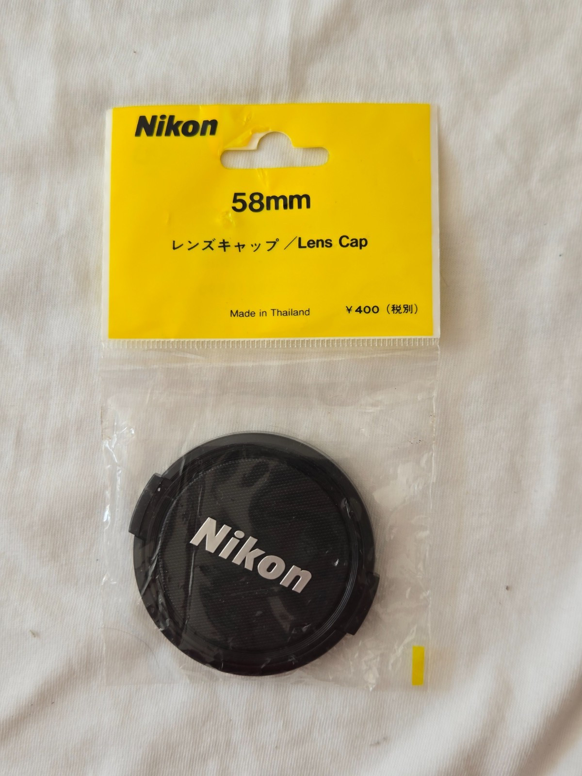 New! Original Genuine Nikon 58mm Snap on plastic Lens Cap Nikon