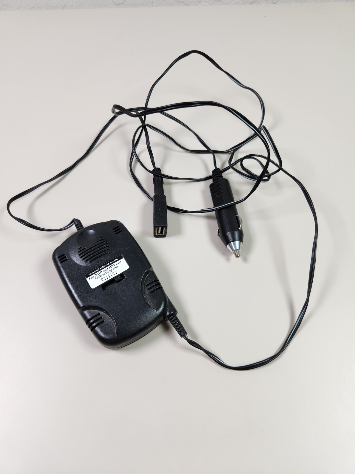 Universal 1000 mA DC/DC 1.5-9 VOLT CAR CHARGER W USB,3,4.5,6,7.5,9 Volt Setting