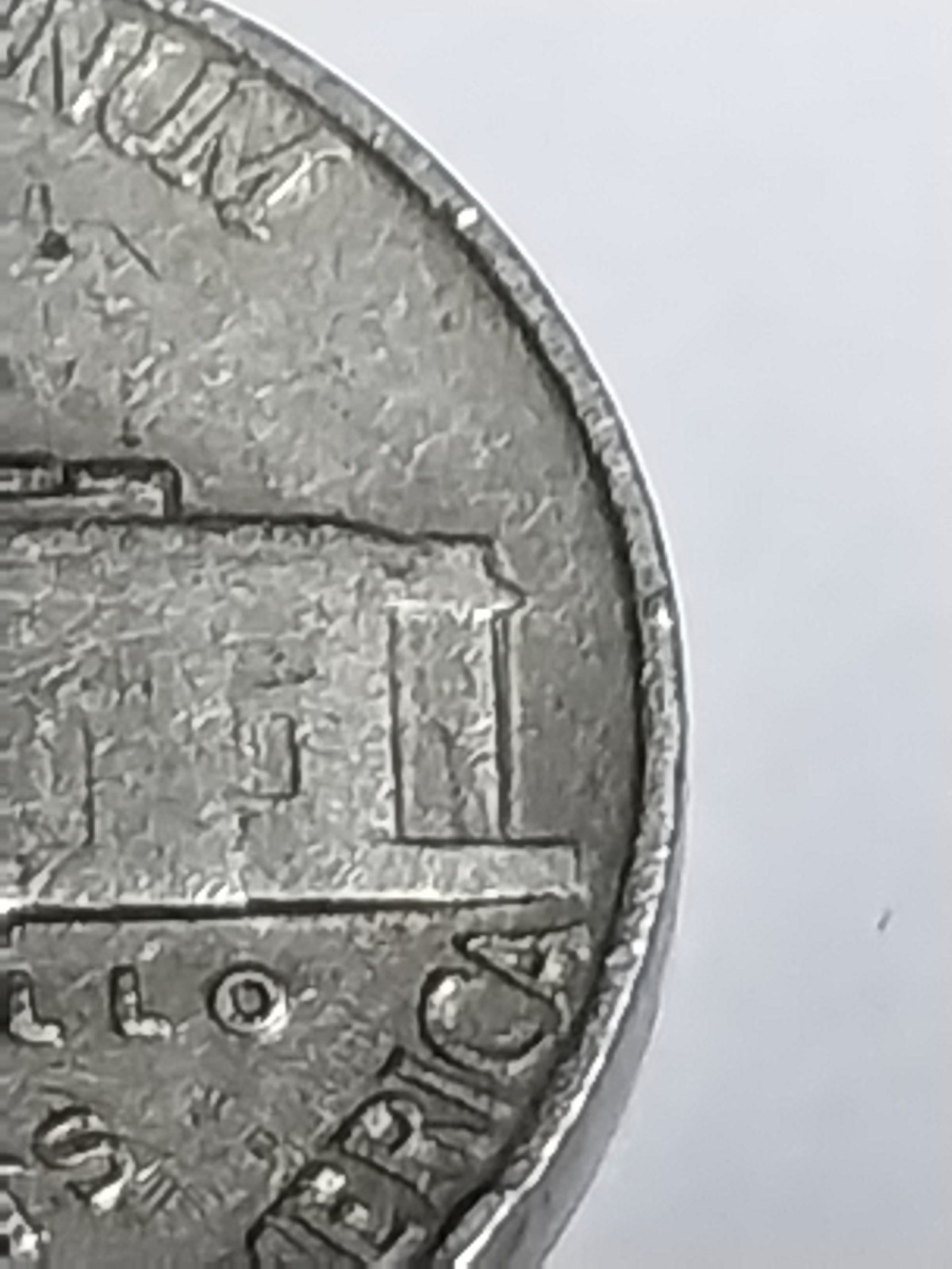 1939 Error Jefferson Nickel. Reverse Doubling. Circulated. Needs Cleaning.