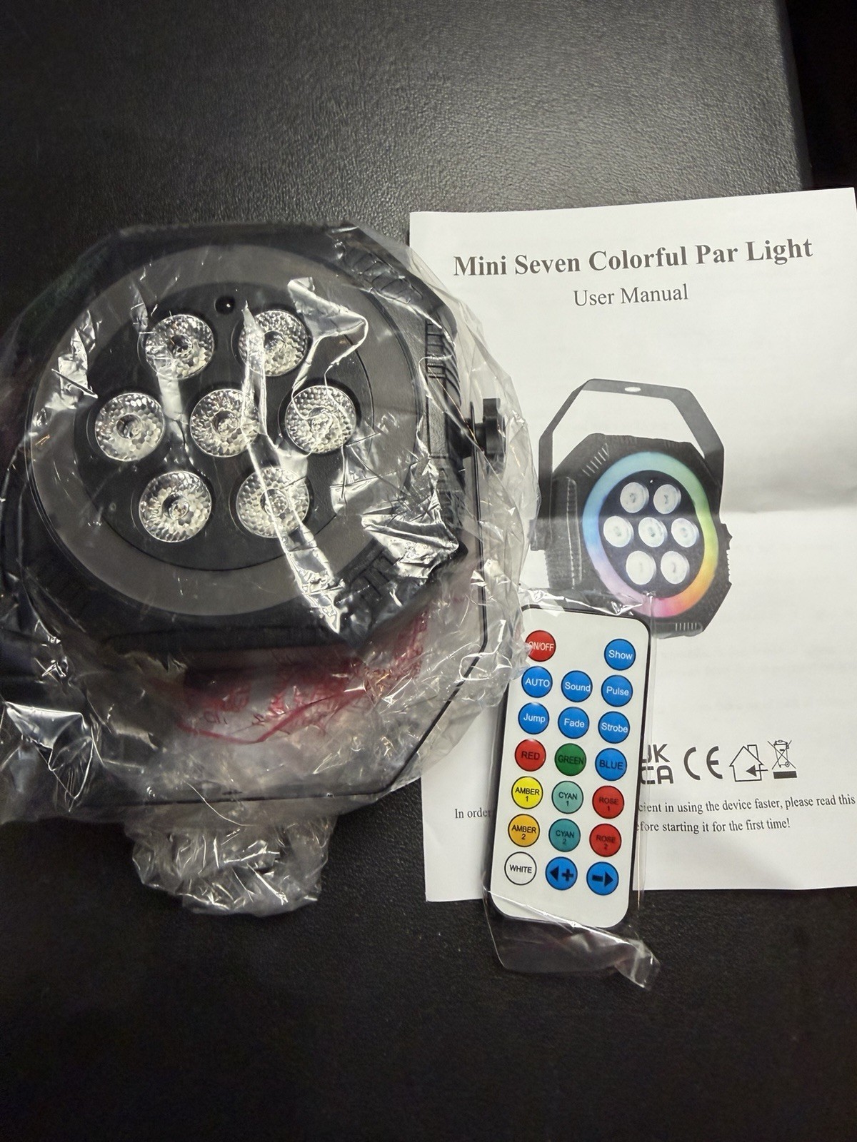 Mini Seven Colorful Par Light. Includes remote control for easy operation.