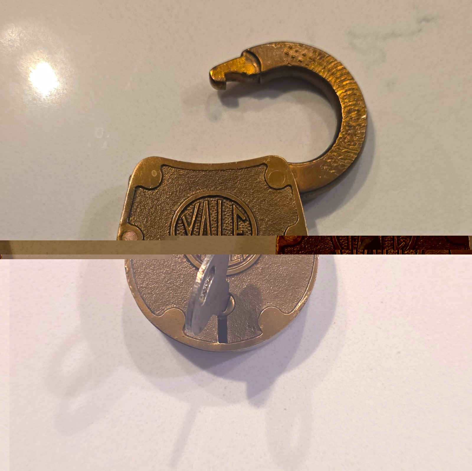 Antique Yale brass lever padlock with its matching working flat key stamped XT19