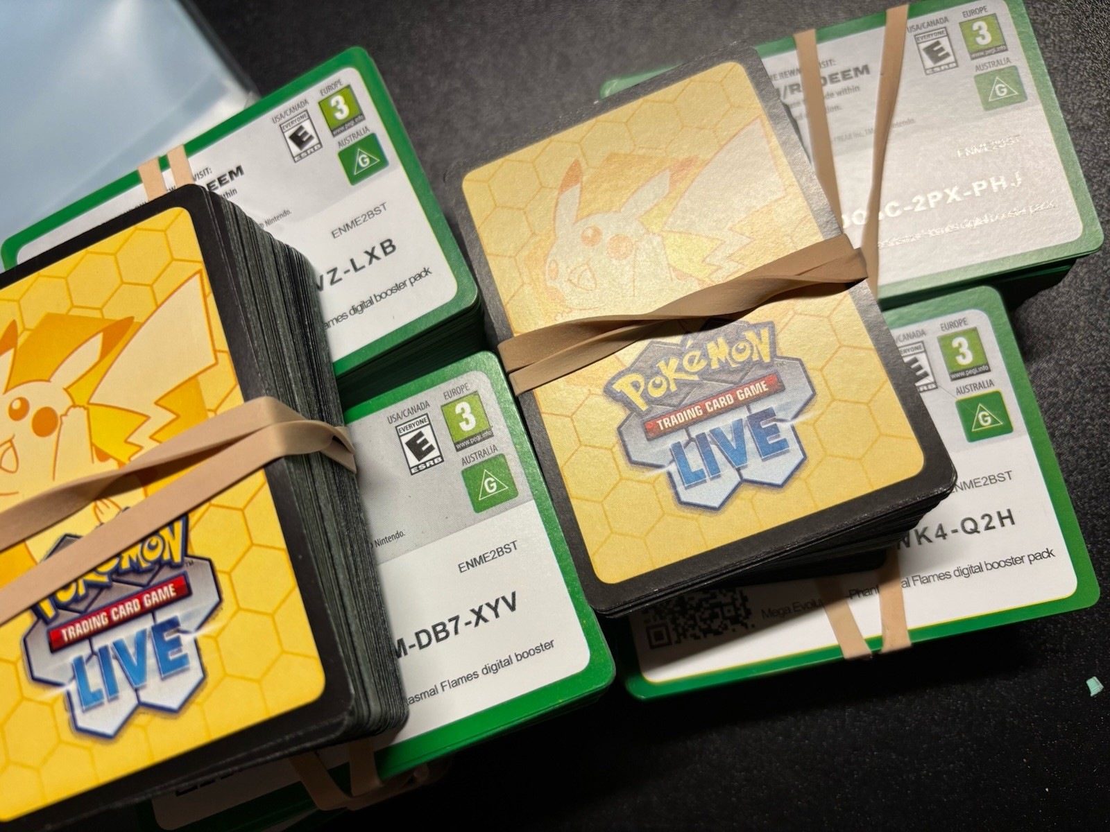 100x Phantasmal Flames Pokemon TCG LIVE Online Codes sent via picture message