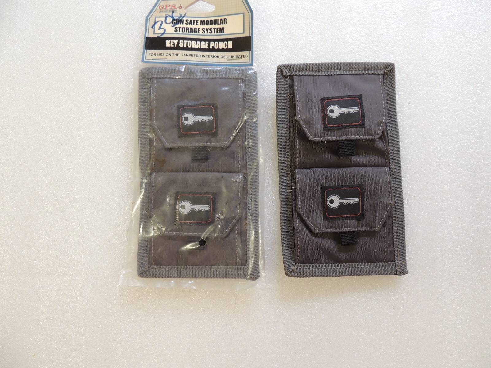 2 sets of 2 GPS Gun Safe Key Storage pouches back attaches to carpeted interior