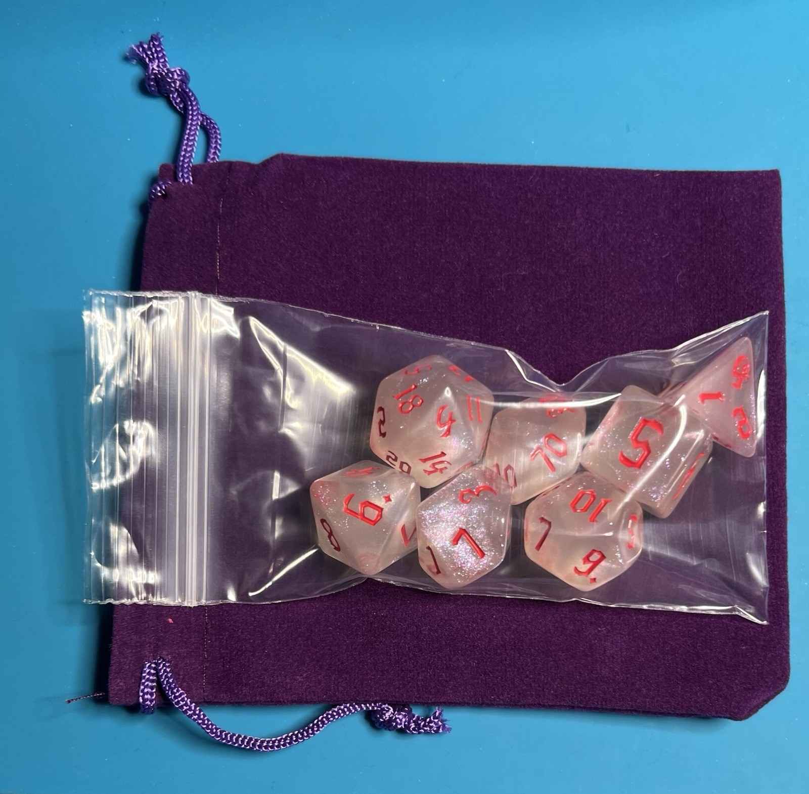 7-Piece Polyhedral RPG Dice Set – Clear Crystal Glitter w/ Red Numbers RPG