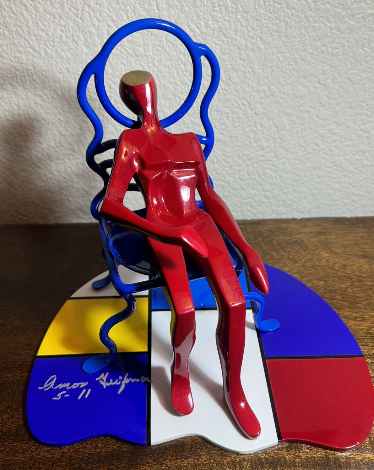 Sitting on Chair Bronze Sculpture By Amor Geifman