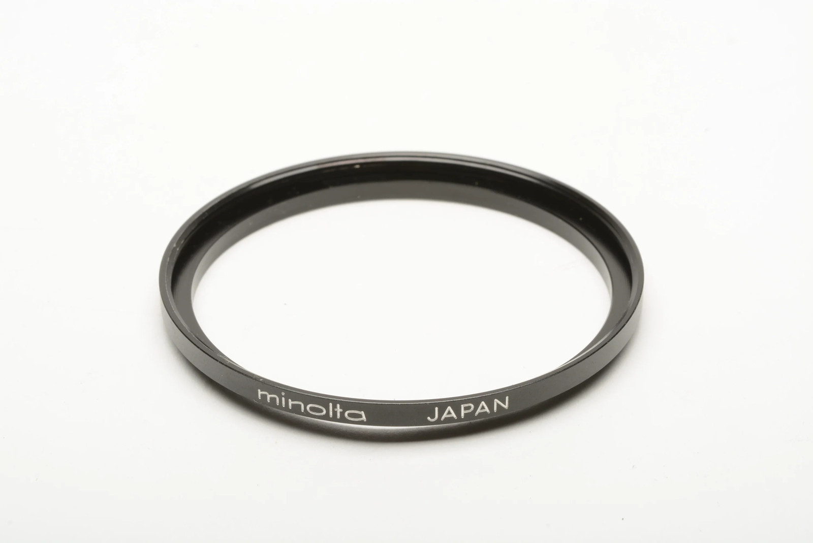 Minolta 52-55mm step up ring (55mm filters on 52mm diameter)