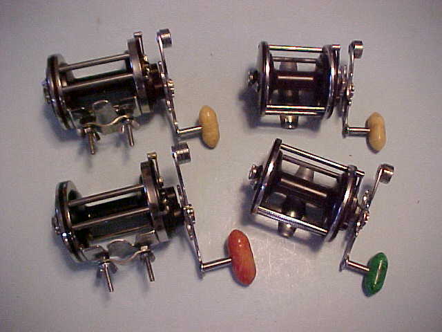 VINTAGE PENN FISHING REELS, 2 PENN SQUIDDERS AND 2 PENN MONOFILS, 4 REELS TOTAL