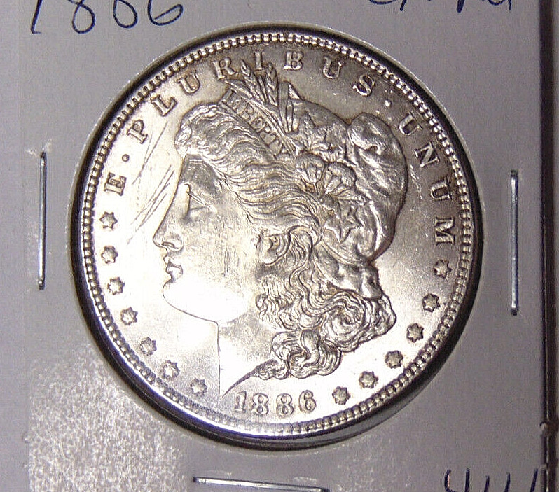 Choice AU 1886-P Morgan Silver Dollar About Uncirculated - Scratched (11.624)