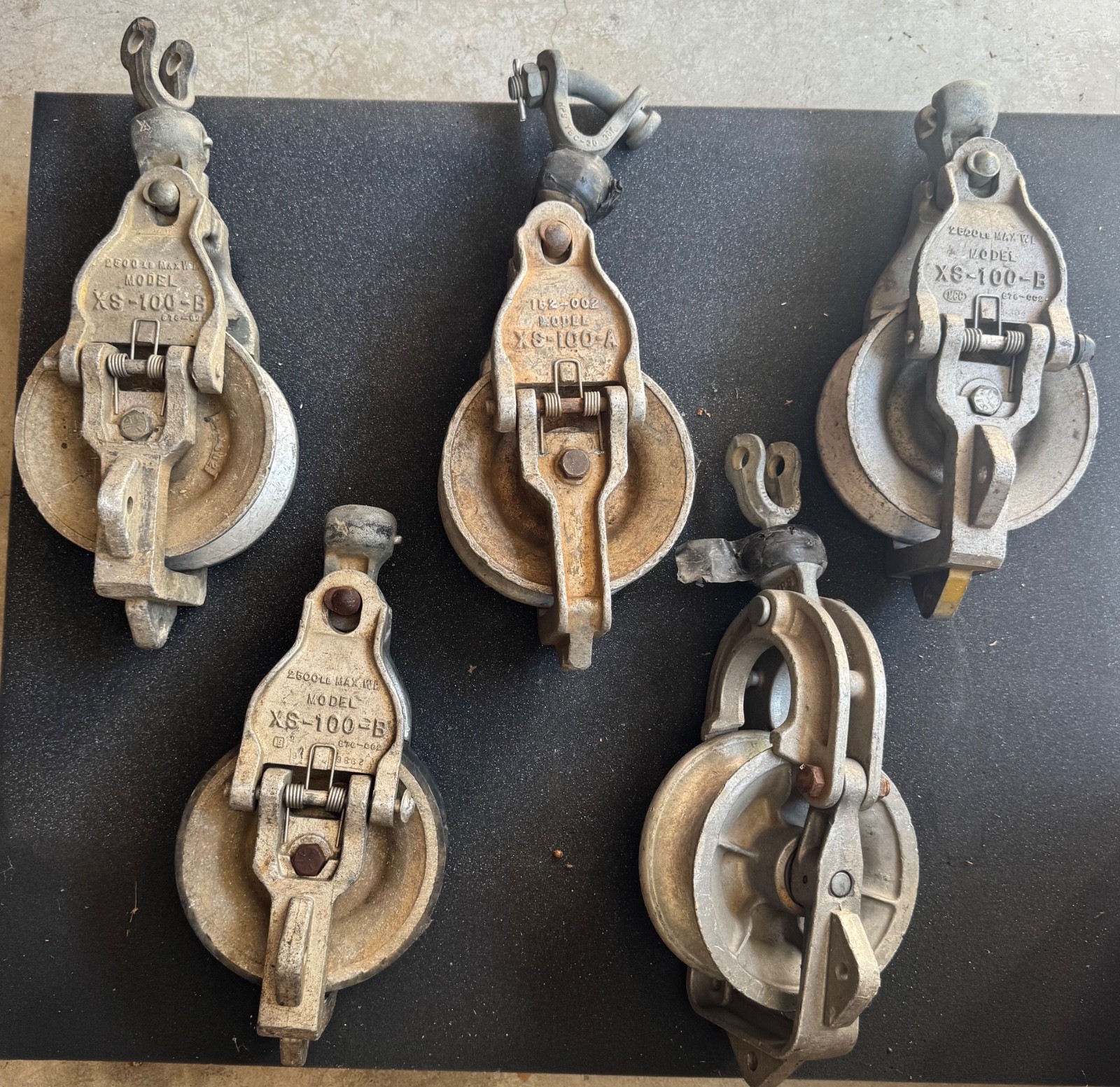 Lot of 5 SHERMAN & REILLY and/or others 2500lb 7 inch stringing blocks.